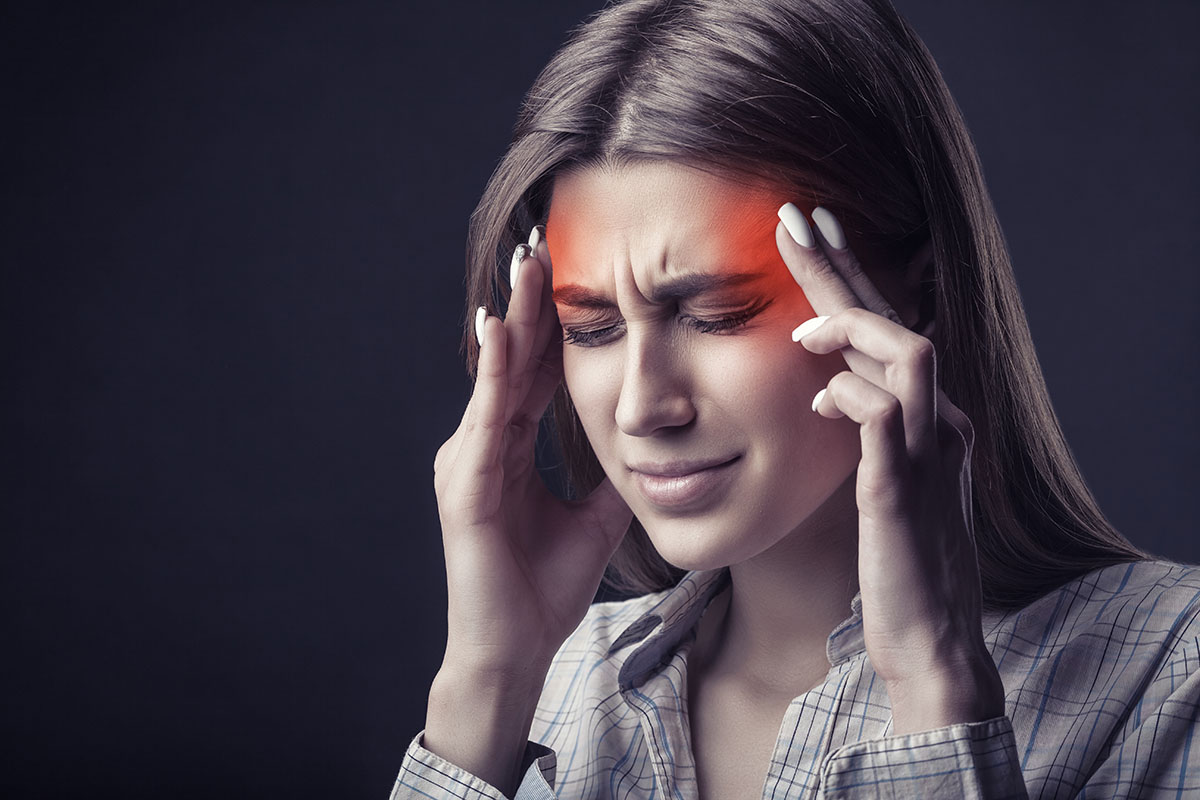 teacher suffering through a headache