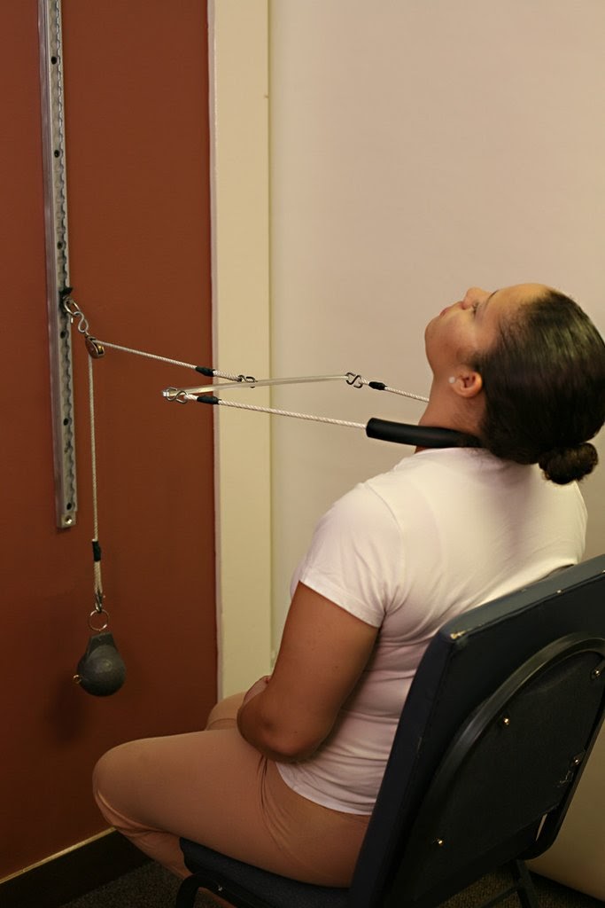 A seated cervical traction device